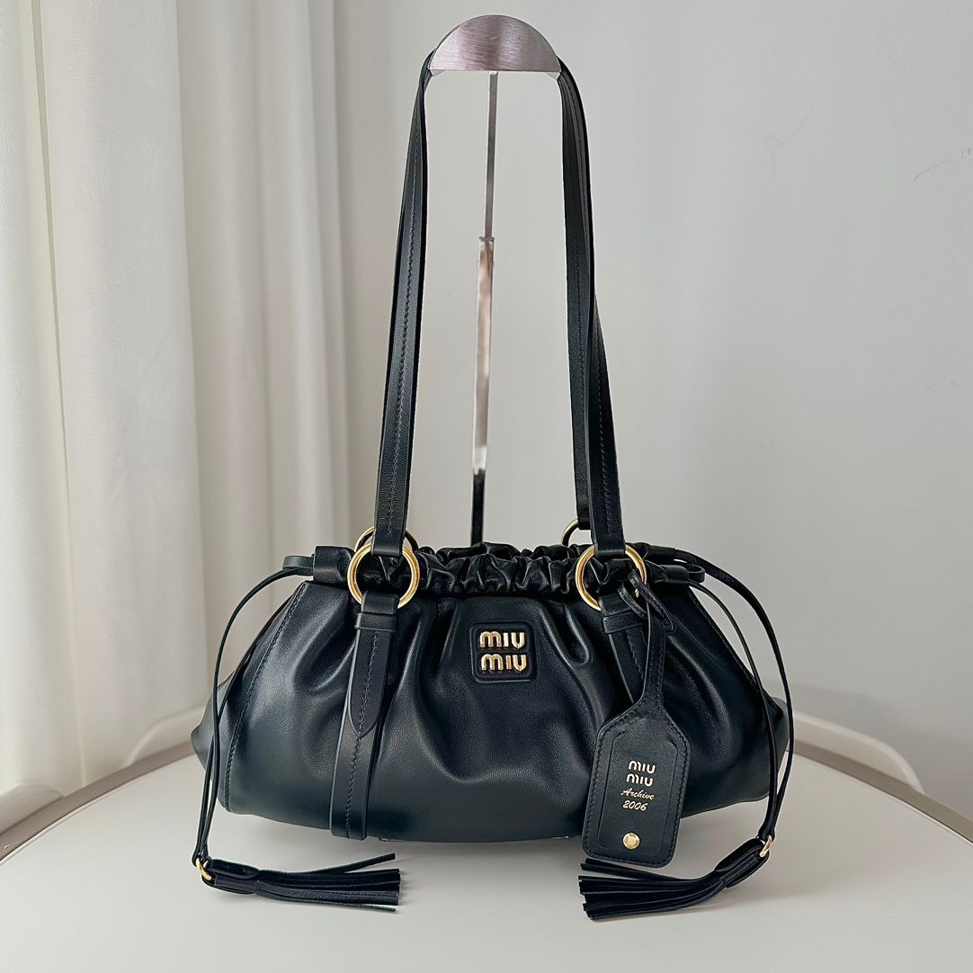MIU vintage kol altı mantı çantası