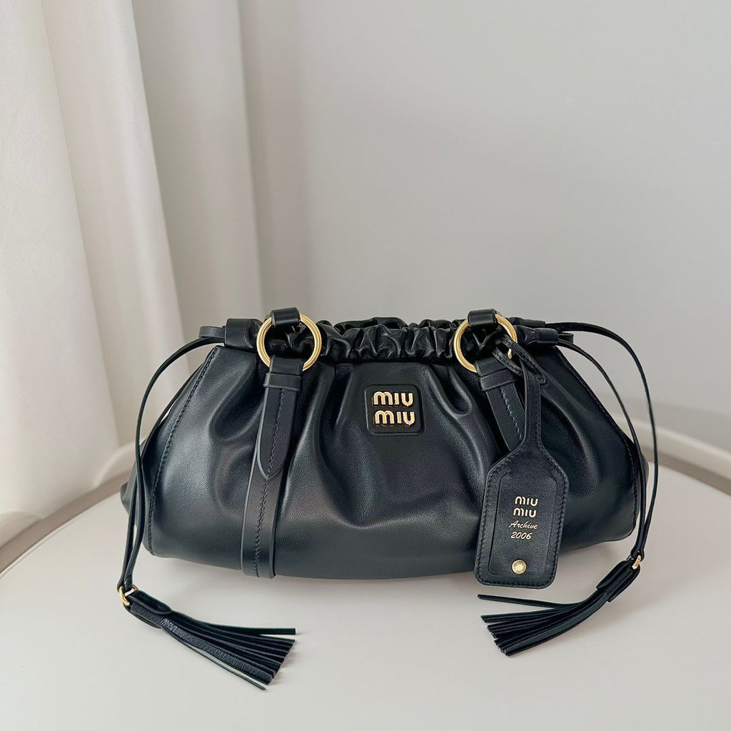 MIU vintage kol altı mantı çantası