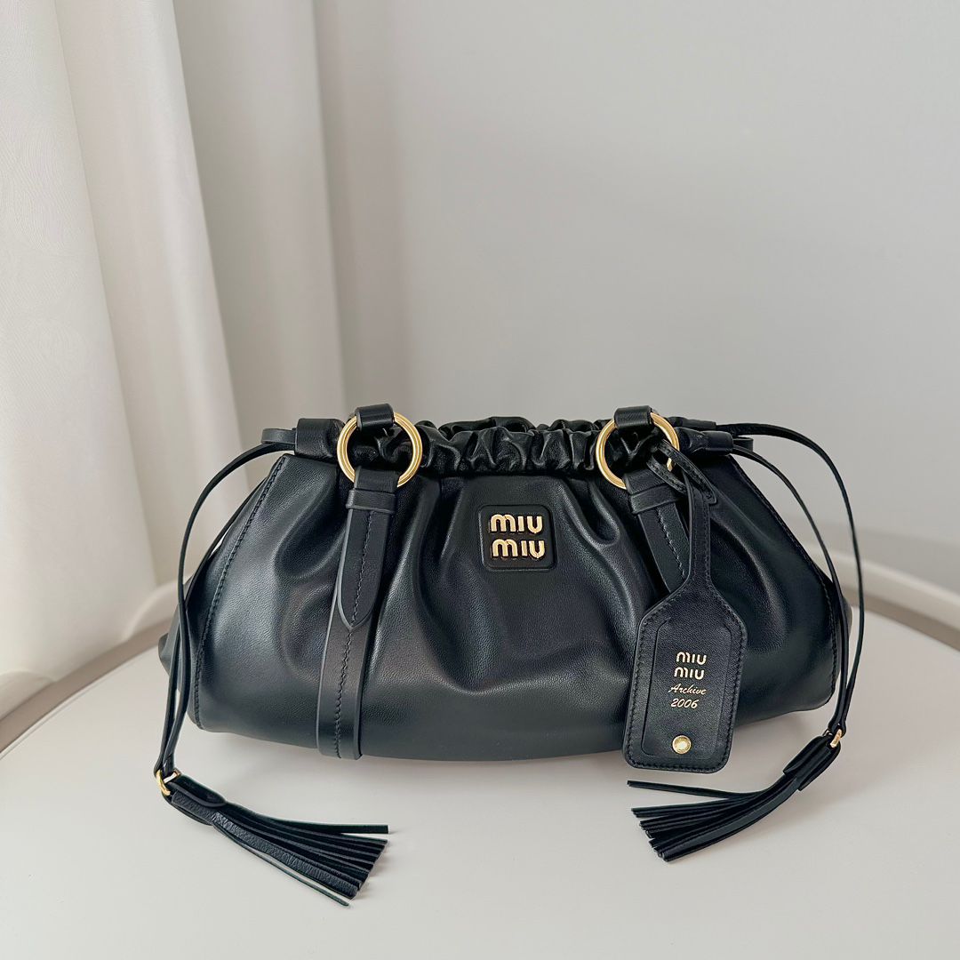MIU vintage kol altı mantı çantası