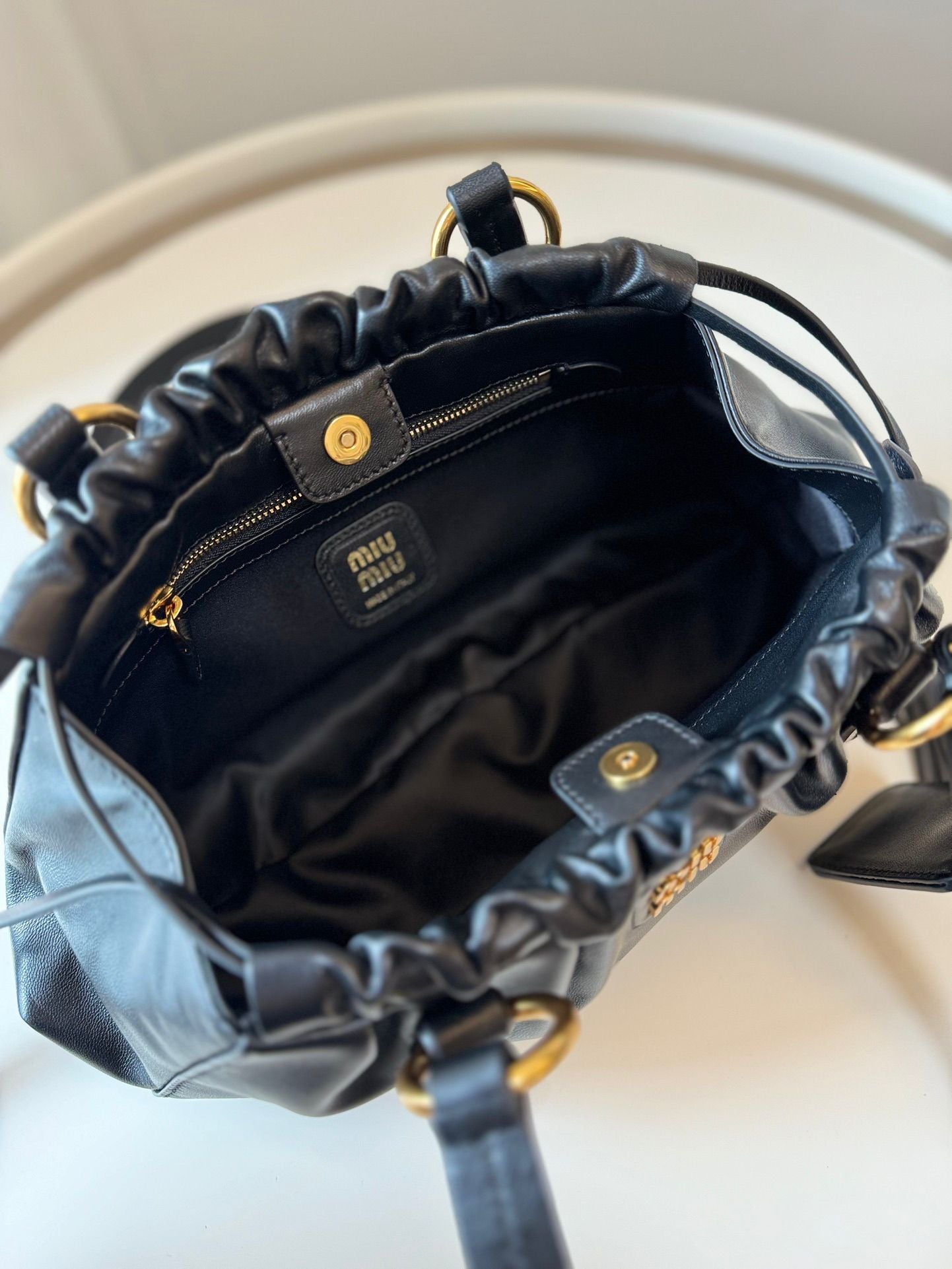 MIU vintage kol altı mantı çantası