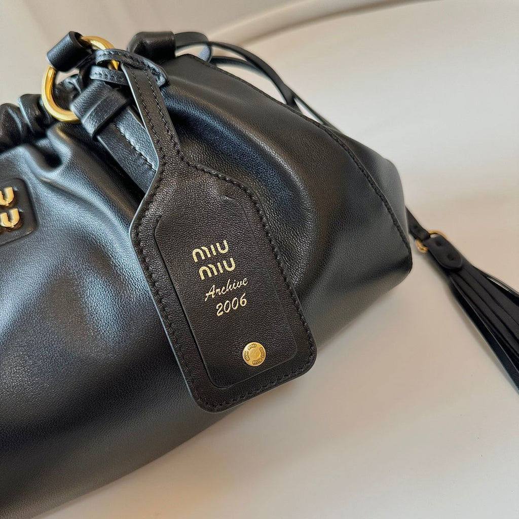 MIU vintage kol altı mantı çantası