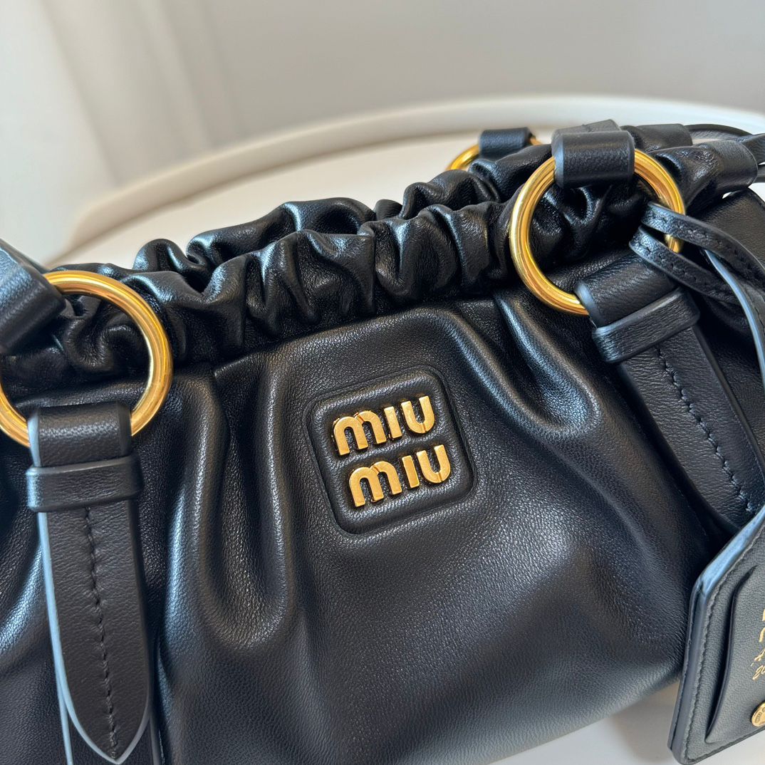 MIU vintage kol altı mantı çantası